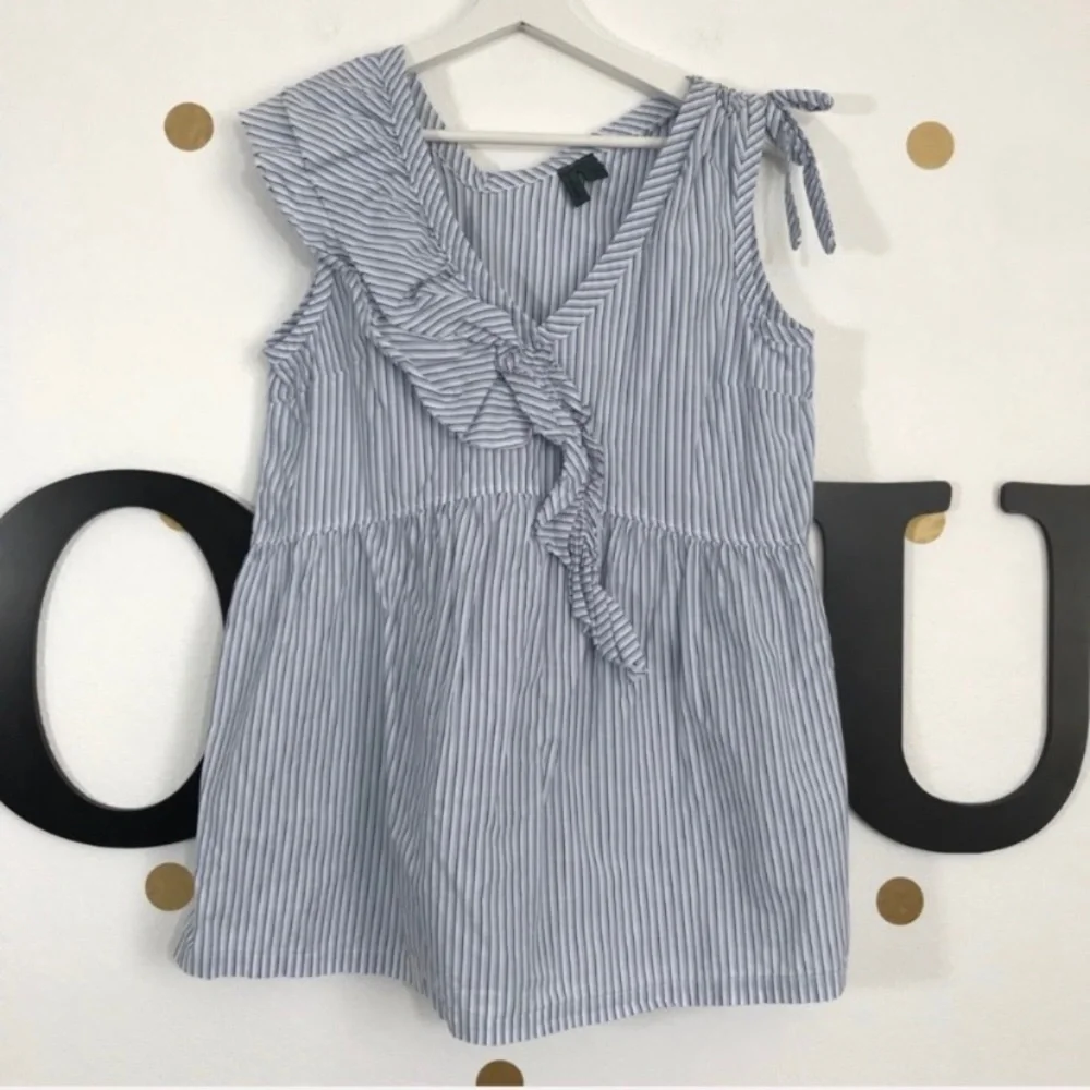 Left of Center M top size M